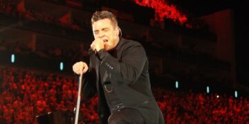 Robbie Williams durante un concierto